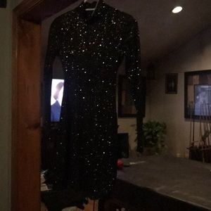 2 Brand new dresses still with tags on them